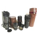 A collection of camera lenses including soviet USS