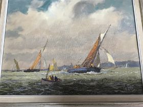 A framed oil on board depicting sailing boats the