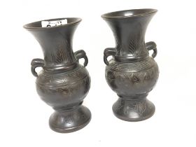 pair of Chinese 19th century bronze vases decorated with stylised acanthus leaves a pattern of