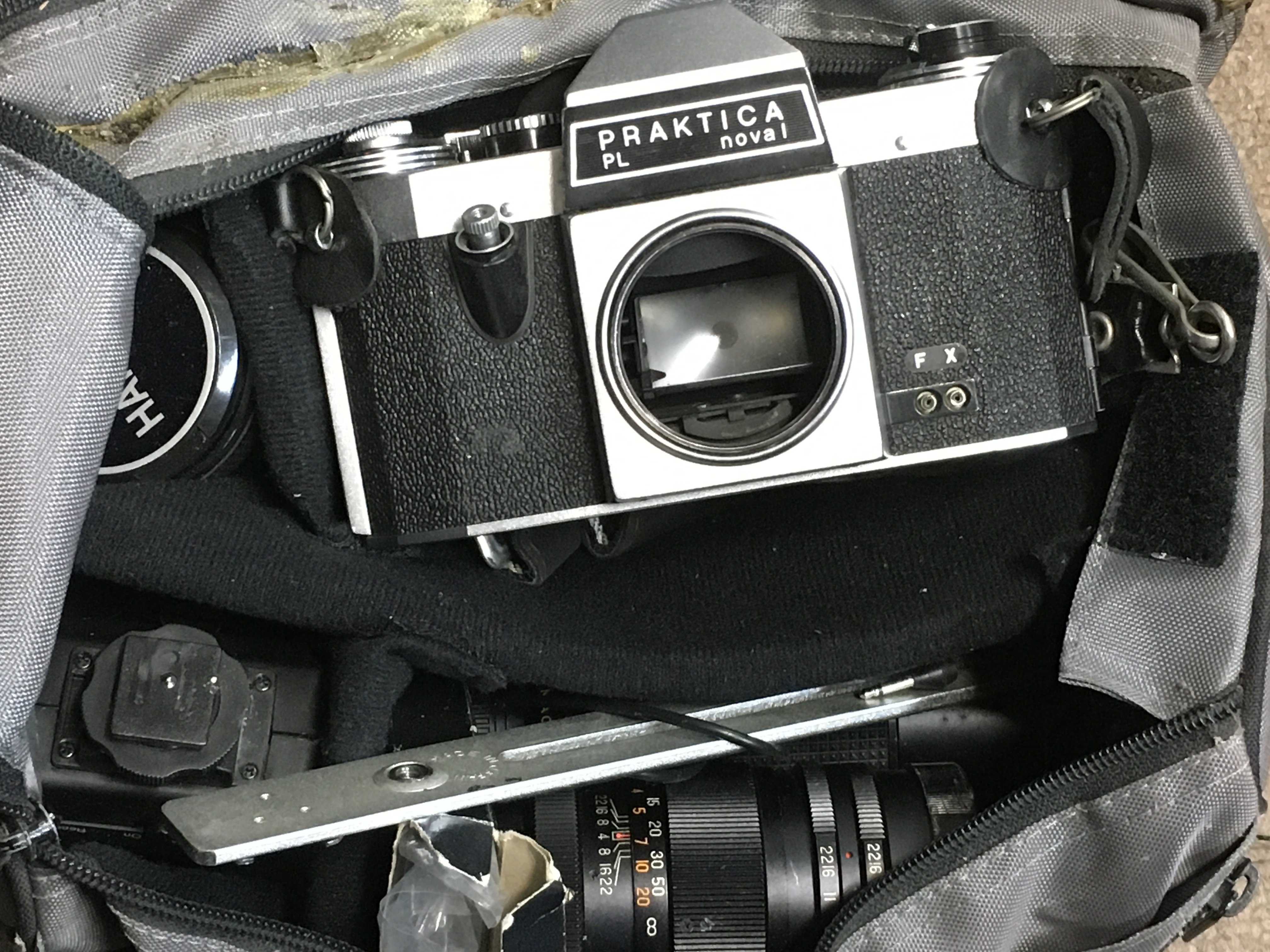 A Praktica PL nova 1 camera, with lenses. This lot