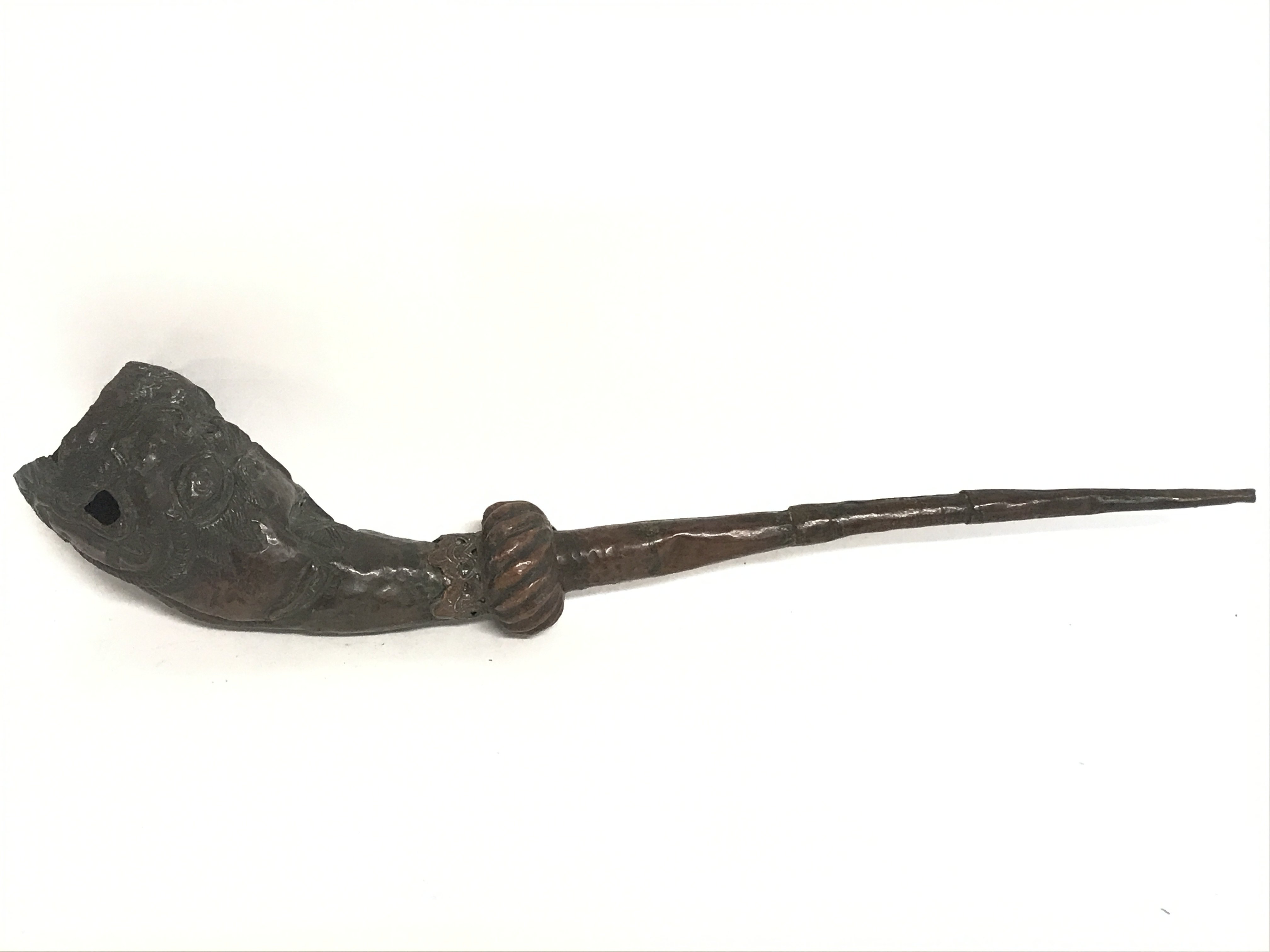 A 19th century copper opium pipe, 42cm long. Posta