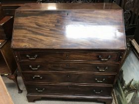 A flame mahogany writing bureau 28.5x100x107.5cm