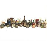 A Collection of whisky miniatures including Grandy