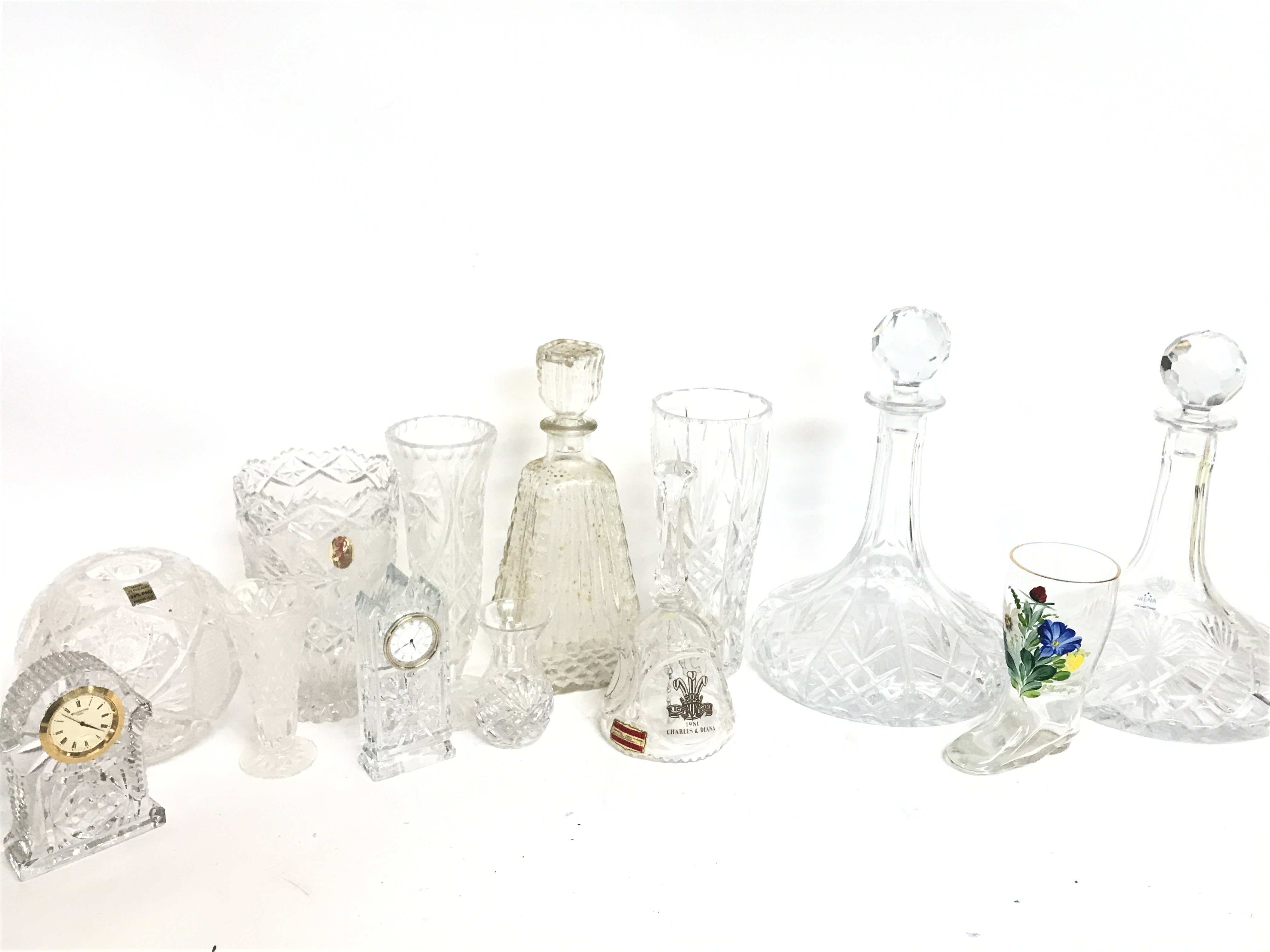 A Collection of cut glass including decanters, clo