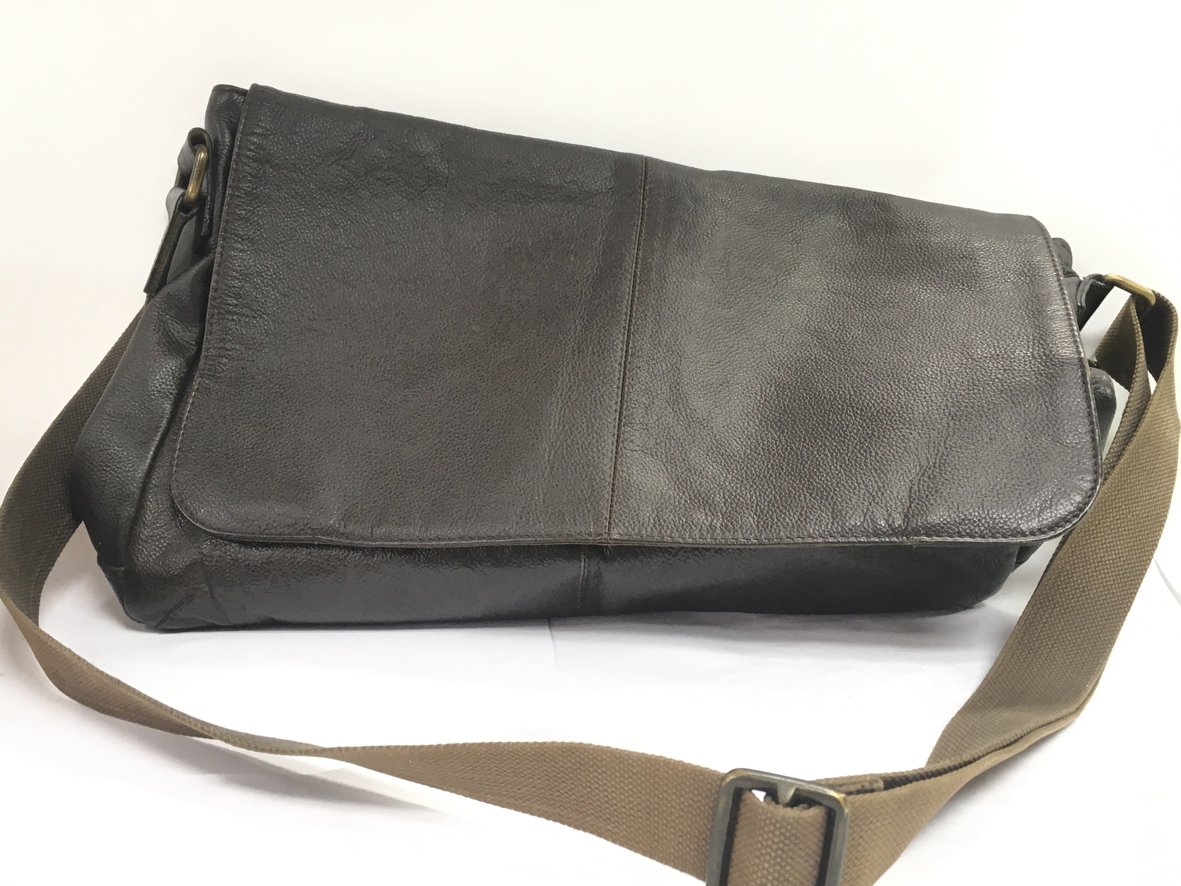 A vintage leather man bag , postage category C