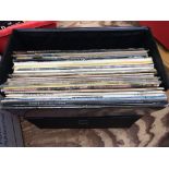 A record case of LPs by various artists including