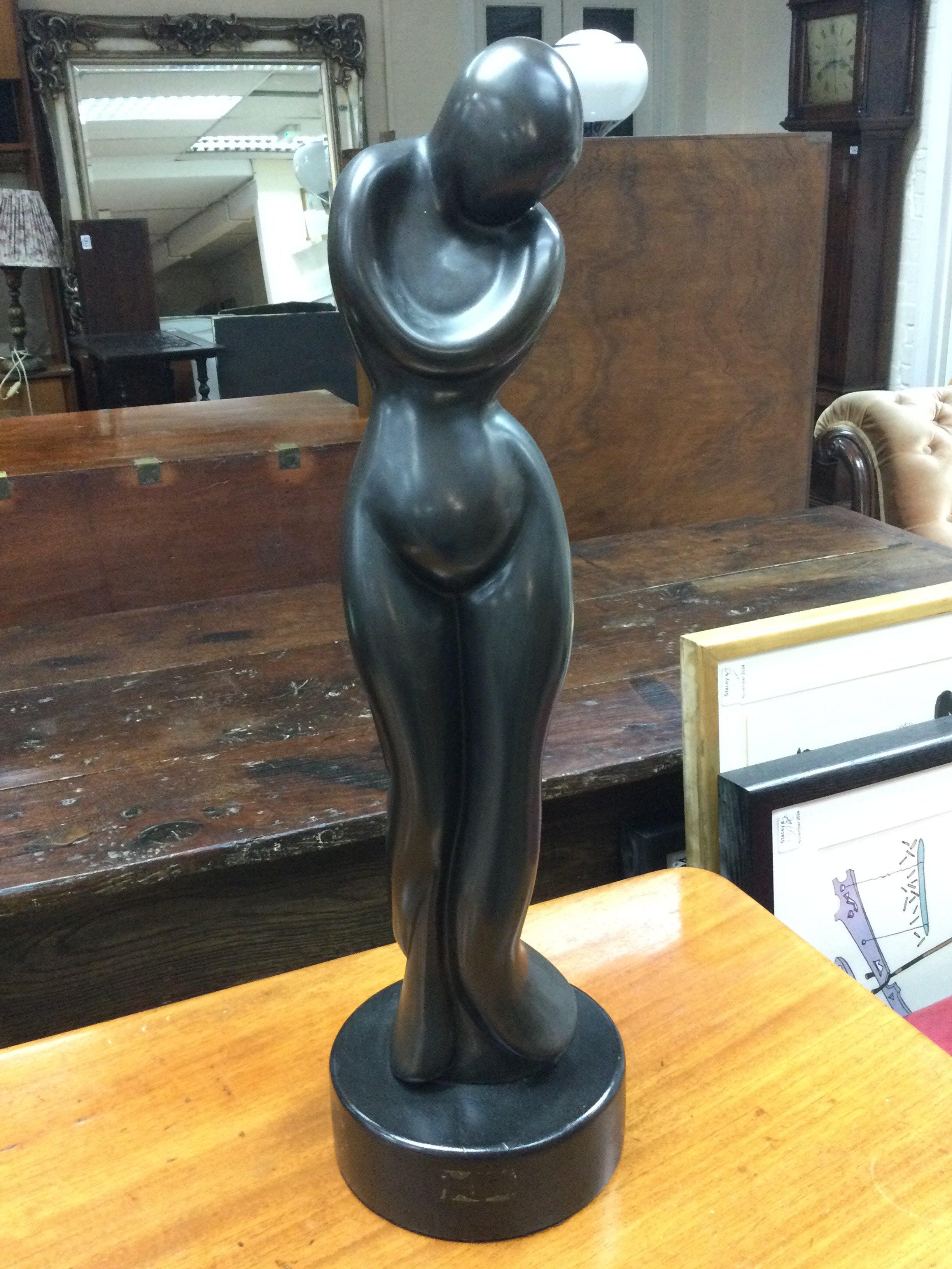 A limited edition modern bronze of a female form o