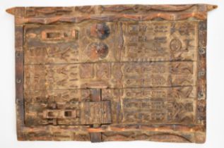 African tribal carved door with working latch and figural decoration, probably Dogon, Mali, 50 x