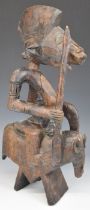 African carved tribal figure of a mounted warrior, Senufo, Mali, 57cm tall.