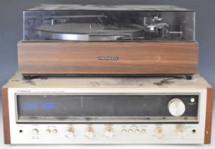 Pioneer stereo receiver model SX-535, and a Pioneer turntable / record player model PL-120