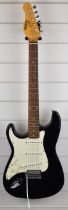Encore Stratocaster style left handed electric guitar with black and white body, in soft case