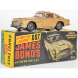 Corgi Toys diecast model James Bond Aston Martin DB5 with gold body, red interior, opening roof,