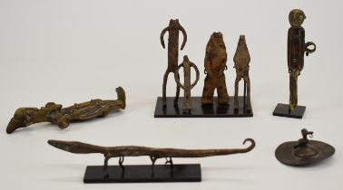 A collection of African bronzes from the estate of Anthony Powell, largest 17cm long.