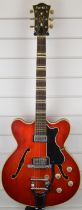 1963 Hofner Verithin electric guitar in cherry red, fitted with Bigsby style tremelo arm, serial