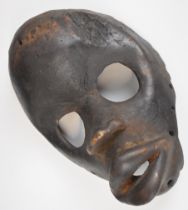 African carved tribal mask, Dan, Cote d'Ivoire / Ivory Coast, 22cm tall.