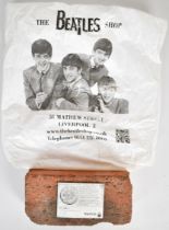 The Beatles interest limited edition brick, one of 5000 salvaged by Royal Life from the original