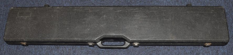 Four shotgun or rifle hard carry cases, all with padded interiors including an aluminium examples