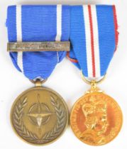 NATO Service Medal with clasp for former Yugoslavia, together with a Queen Elizabeth II Queen's
