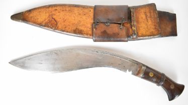 WW2 kukri knife with wooden grips, stamped R A II 11-41 to 33cm blade and a leather scabbard stamped