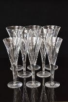 John Rocha for Waterford Crystal eight clear cut glass champagne flutes or wine glasses, five 25cm