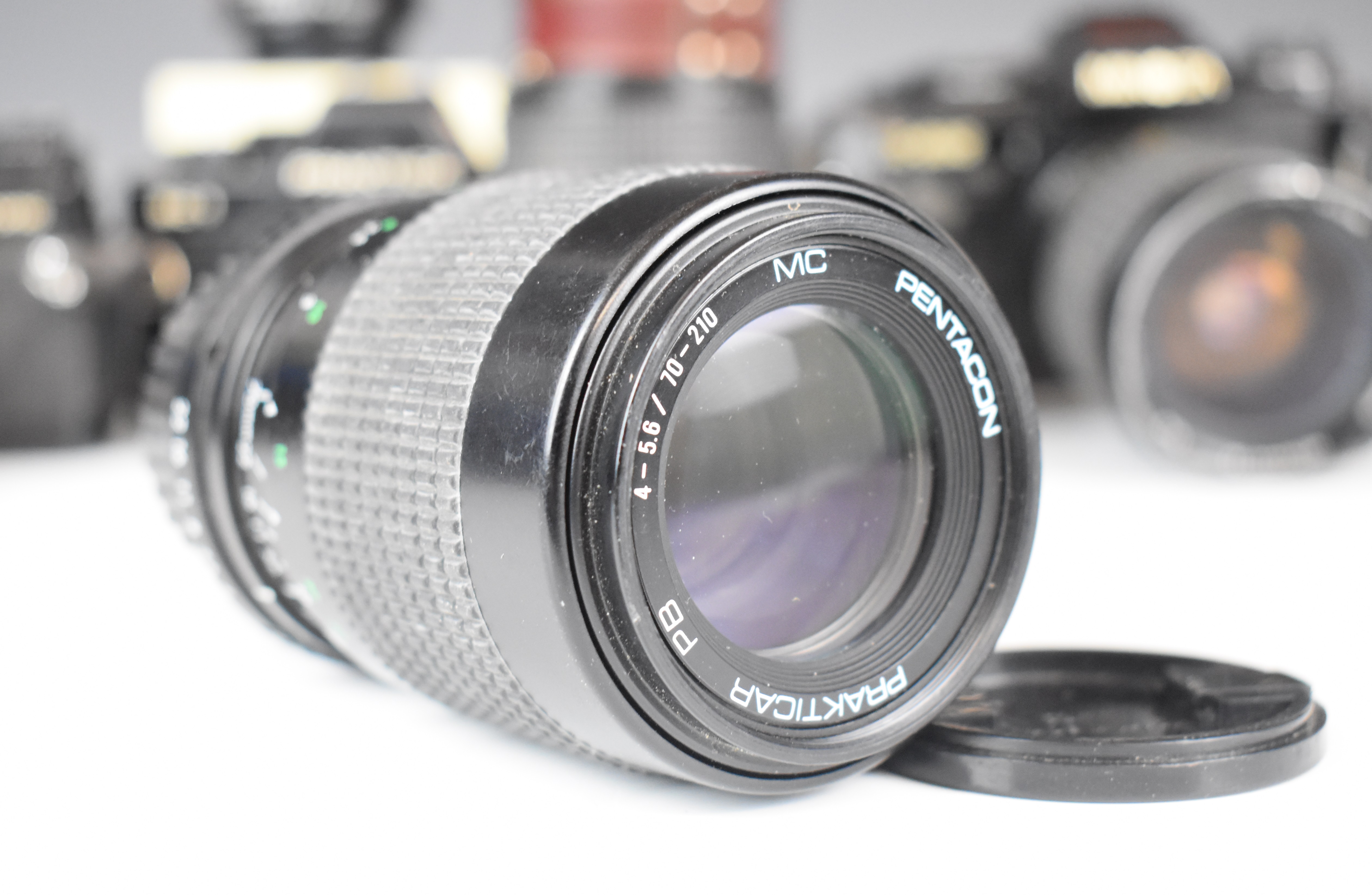 Three 35mm SLR cameras comprising Minolta X-500 with Minolta MD 50mm 1:1.7 and Super Paragon 28- - Image 3 of 11