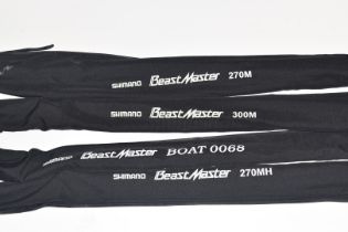 Four Shimano 'Beastmaster' sea fishing rods comprising Boat 0068, two 270m and 300m