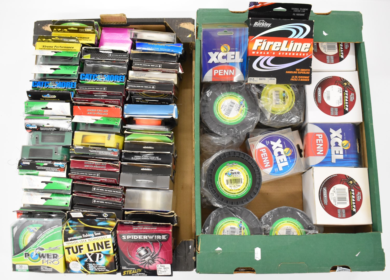 Large quantity of braid and mono fishing line by Penn, Stealth, Power Pro etc, in two trays