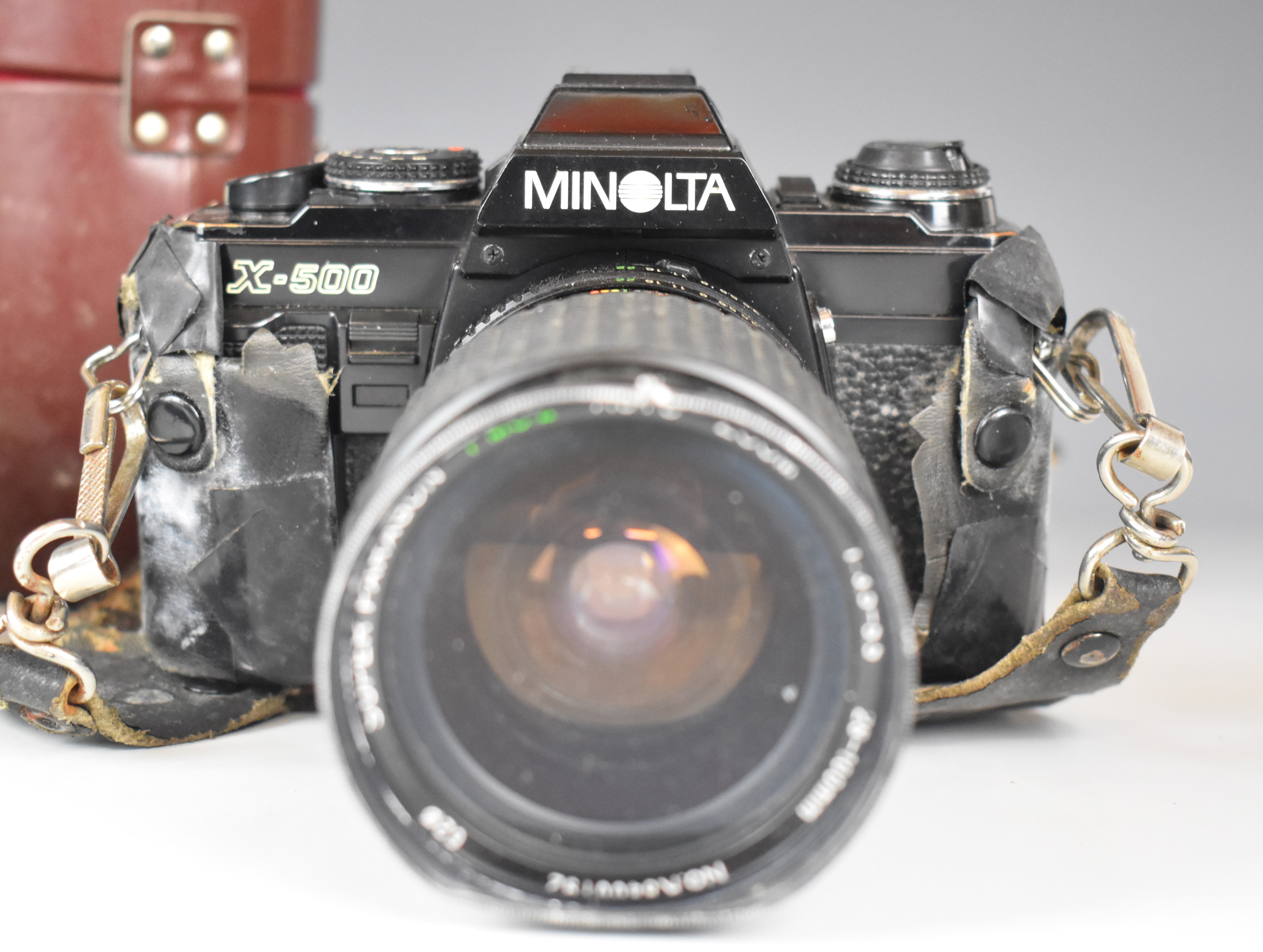 Three 35mm SLR cameras comprising Minolta X-500 with Minolta MD 50mm 1:1.7 and Super Paragon 28- - Image 8 of 11