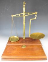 Bartlett Bristol brass banker's or similar weighing scales, on wooden base, height 60cm