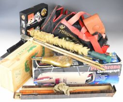A collection of gun and shooting related accessories including Napier cleaning kits, Browning