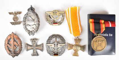 Eight German badges and medals including WW1, WW2 and post war, Pilot's Badge, 25 Years Long Service