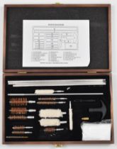 A shotgun and rifle cleaning kit, in fitted wooden case.