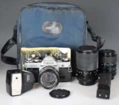 Canon AE-1 35mm SLR camera outfit including Canon 50mm 1:2, Carl Zeiss f=35-70mm 1:3.5-4.8 and