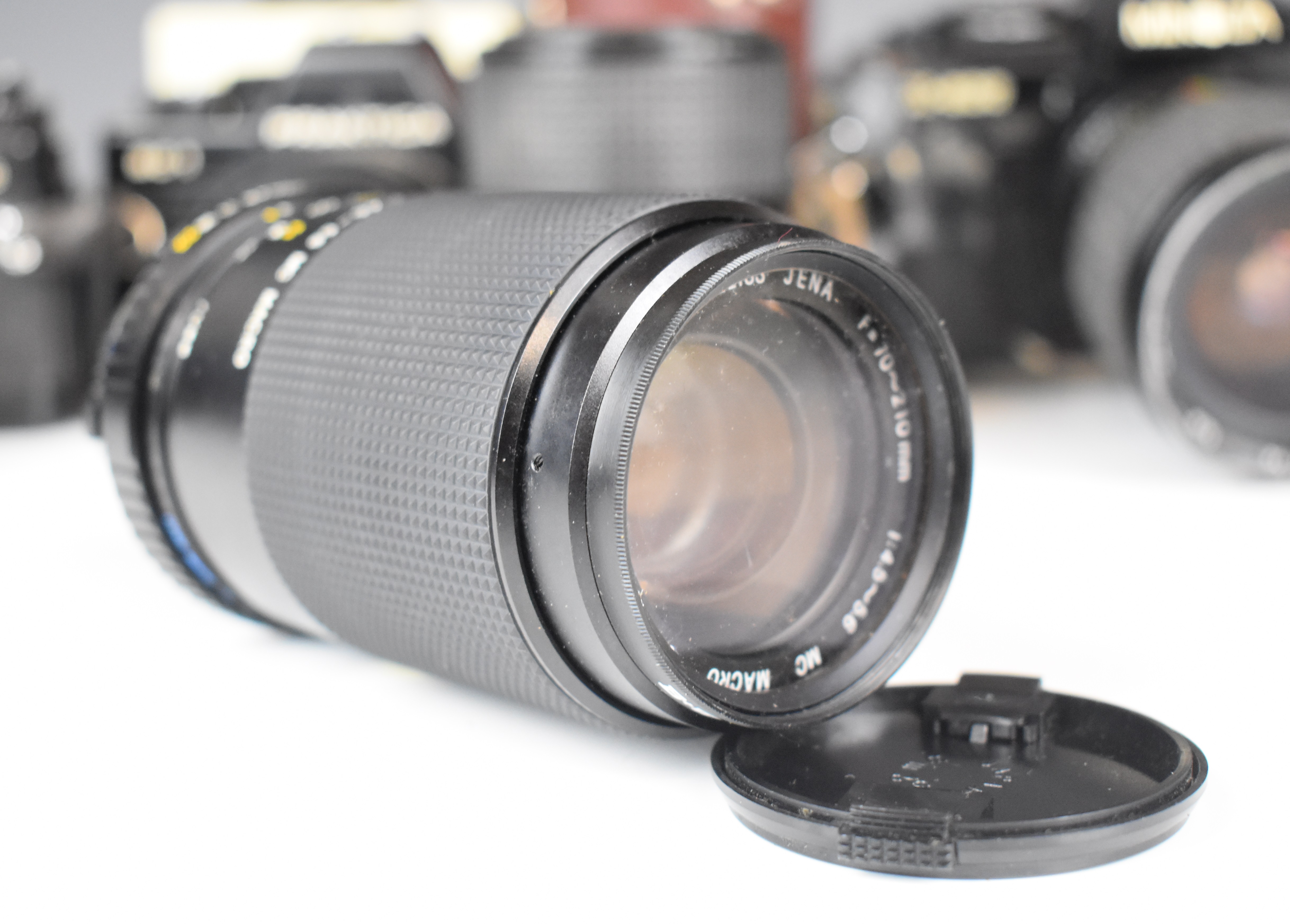 Three 35mm SLR cameras comprising Minolta X-500 with Minolta MD 50mm 1:1.7 and Super Paragon 28- - Image 2 of 11