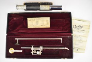 Cased Bowen & Company planimeter together with an Otis King spiral slide rule