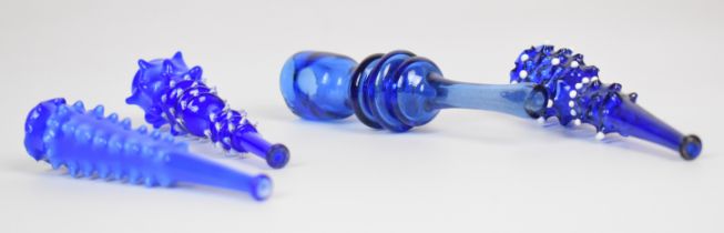 Four blue glass cheroot holders two with applied decoration, largest 9cm long.
