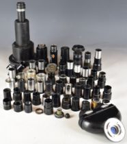 Lenses and eyepieces to include Carl Zeiss binocular eyepiece, Russian lenses and Baker London