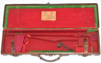 Brass and leather bound rook rifle case with label 'Holland & Holland Gun & Rifle Manufacturers 98