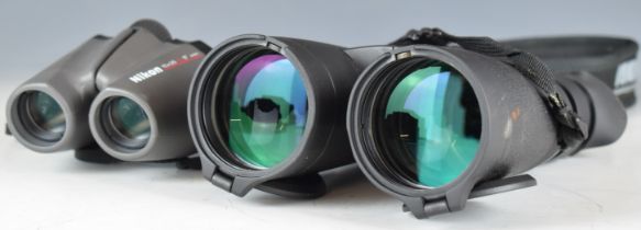 Yukon Point 8x56 binoculars together with a pair of Nikon 10x25 binoculars