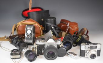 Collectable cameras to include Paillard Bolex BH8 cine camera with three various lenses, manuals