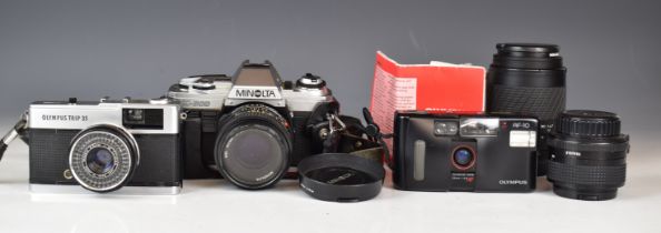 Three 35mm cameras comprising Minolta X-300 SLR with 28mm 1:2.8 and 50mm 1:1.7 lenses, Sigma 70-