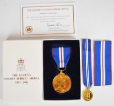 Queen Elizabeth II Queen's Golden Jubilee Medal, certificate of authenticity, miniature and box