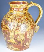 Slipware jug with motto 'Ye Fox and Hounds Guide Ale for Ye Harvest' and 'Phillip Burr / Burns