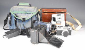 Collectable cameras comprising Zeiss Ikon or similar Compur, folding plate style camera, Canonet