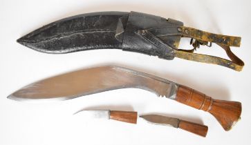 WW2 era kukri knife with wooden grip, 31cm blade, leather scabbard with belt attachments and karda