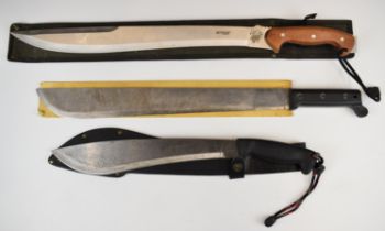 Three machete style knives including Ontario US Knife and Jungle Master Premium Design hand
