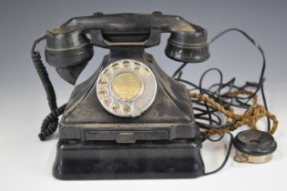 Vintage black Bakelite telephone with additional wall box, marked to underside of main phone FWR 55