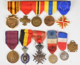 Eleven Frence / Belgium medals including commemorative Battle of the Somme, La Marne, Croix De