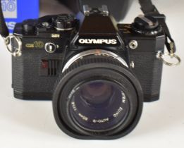 Olympus OM10 35mm SLR camera with 1:1.8 f=50mm lens, together with manuals and original box for body