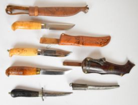 Four hunting / skinning knives comprising two Finnish, Norwegian Brusletto Geilo and Halling Swedish